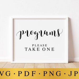 May include: White sign with black text that reads "programs" in a cursive font. Below the word "programs" is the text "please take one".