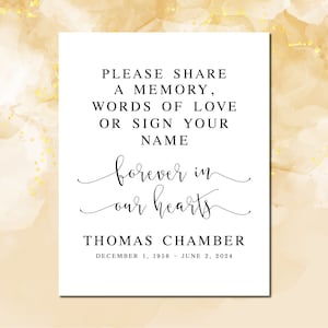 Op de afbeelding: Een wit bord met zwarte tekst die luidt: "Deel alstublieft een herinnering, woorden van liefde of teken uw naam voor altijd in onze harten Thomas Chamber 1 december 1956 - 2 juni 2024"