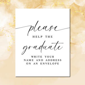 May include: White sign with black text that reads "Please help the graduate. Write your name and address on an envelope."