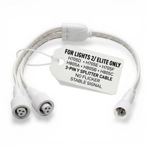 Puede incluir: Un cable divisor en Y blanco de 3 pines con múltiples conectores. El cable tiene una etiqueta que dice "FOR LIGHTS 2/ ELITE ONLY" y enumera los números de modelo. La etiqueta también indica "NO FLICKER STABLE SIGNAL".