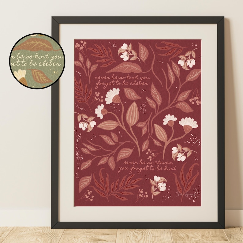 May include: A framed art print with a red background and a floral pattern. The print features the text "never be so kind you forget to be clever" and "never be so clever you forget to be kind".