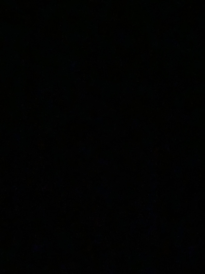 May include: A black background.