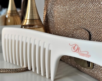 Large wide tooth comb, great for detangling hair!