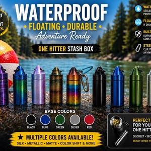May include: A collection of nine cylindrical aluminum stash boxes in various finishes including metallic, matte, and color-shift. Each container features a pointed screw-top lid with a small metal loop and a carabiner attached to one unit.
