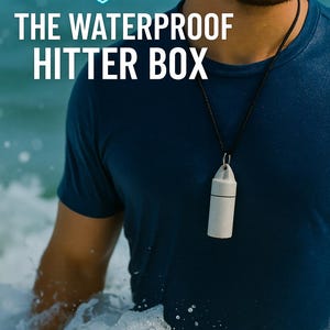 May include: A cylindrical, off-white waterproof hitter box pendant hanging from a black cord. The text Cr3ativeMindz and THE WATERPROOF HITTER BOX are displayed in white and light blue above the pendant against a blurred ocean background.