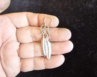 Pendientes de plumas de plata de estilo sudoccidental