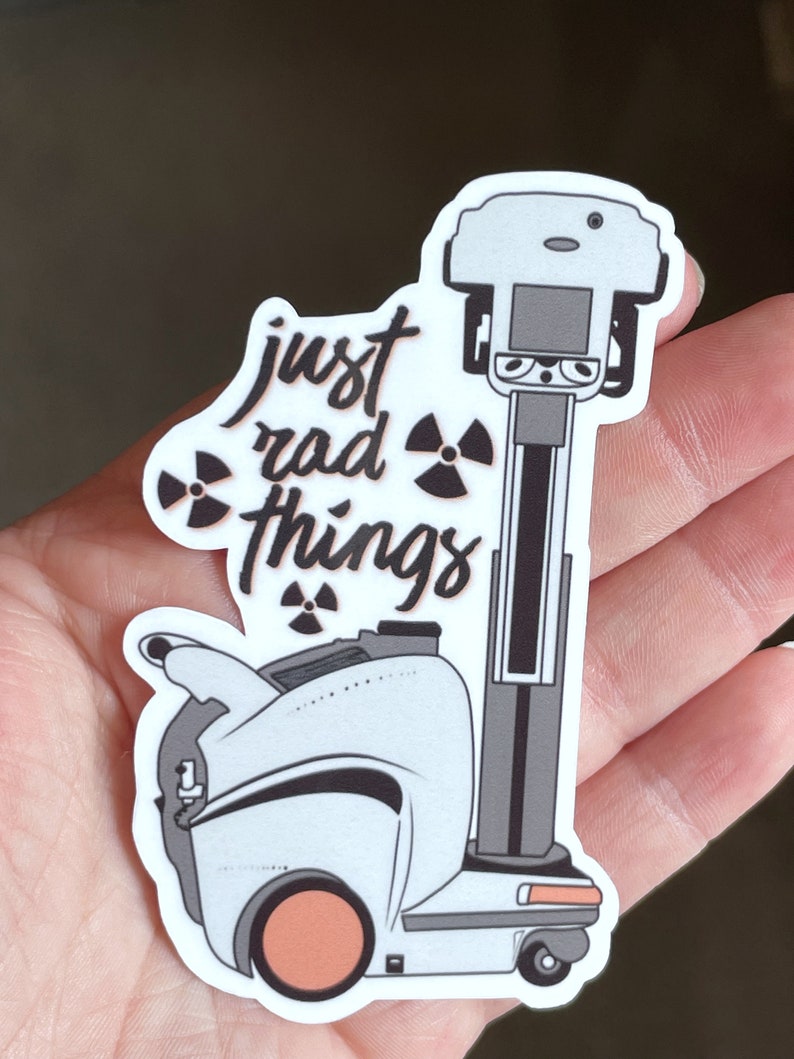 May include: White sticker with a cartoon robot and the text "just rad things" in black. The robot has a black and white striped body and a black and white striped head with a black eye. The robot has a black and white striped arm with a black and white striped hand. The robot has a black and white striped leg with a black and white striped foot. The robot has a black and white striped wheel. The robot has a black and white striped antenna. The robot has a black and white striped tail. The robot has a black and white striped body. The robot has a black and white striped head. The robot has a black and white striped arm. The robot has a black and white striped hand. The robot has a black and white striped leg. The robot has a black and white striped foot. The robot has a black and white striped wheel. The robot has a black and white striped antenna. The robot has a black and white striped tail. The robot has a black and white striped body. The robot has a black and white striped head. The robot has a black and white striped arm. The robot has a black and white striped hand. The robot has a black and white striped leg. The robot has a black and white striped foot. The robot has a black and white striped wheel. The robot has a black and white striped antenna. The robot has a black and white striped tail.