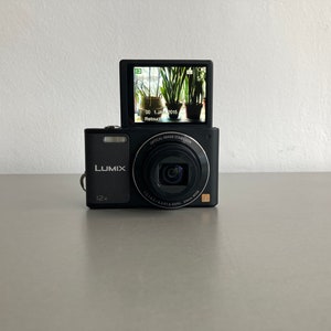 Panasonic Lumix DMC-SZ10 Black Digicam, Working Digital Camera, Vlog Camera With Flip Screen, Boxed image 1