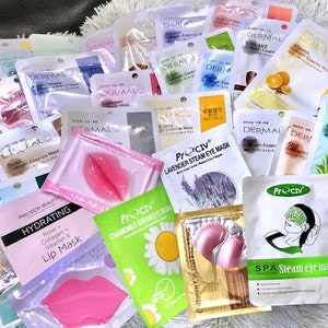 May include: An assortment of eye and lip masks in various colours and designs. The masks are packaged in individual pouches with product names and descriptions. Some of the masks are labelled "Dermal" and "Prociv".