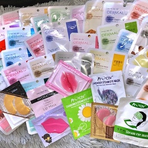 May include: A selection of face and eye masks in individual packets. The masks are in a range of colours and designs, including pink, blue, green and white. Some of the masks have text on them, such as "Dermal" and "Proctiv".