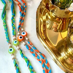 Latest EVIL EYE Colourful Rakhi for Bhai Bhabi 2025 |Raksha Bandhan| Brother Sister Bracelet |Indian Embroidery Minimalist Thread| Band Dora