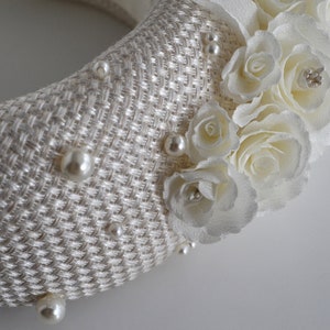 Bridal headband with pearls.  Bridal flower crown has been covered in ivory fabric. Halo crown headband has been trimmed with flowers. Modern and elegant wedding fascinator will instantly elevate any outfit.One size. Width - 7 cm, height of 4-4,5 cm