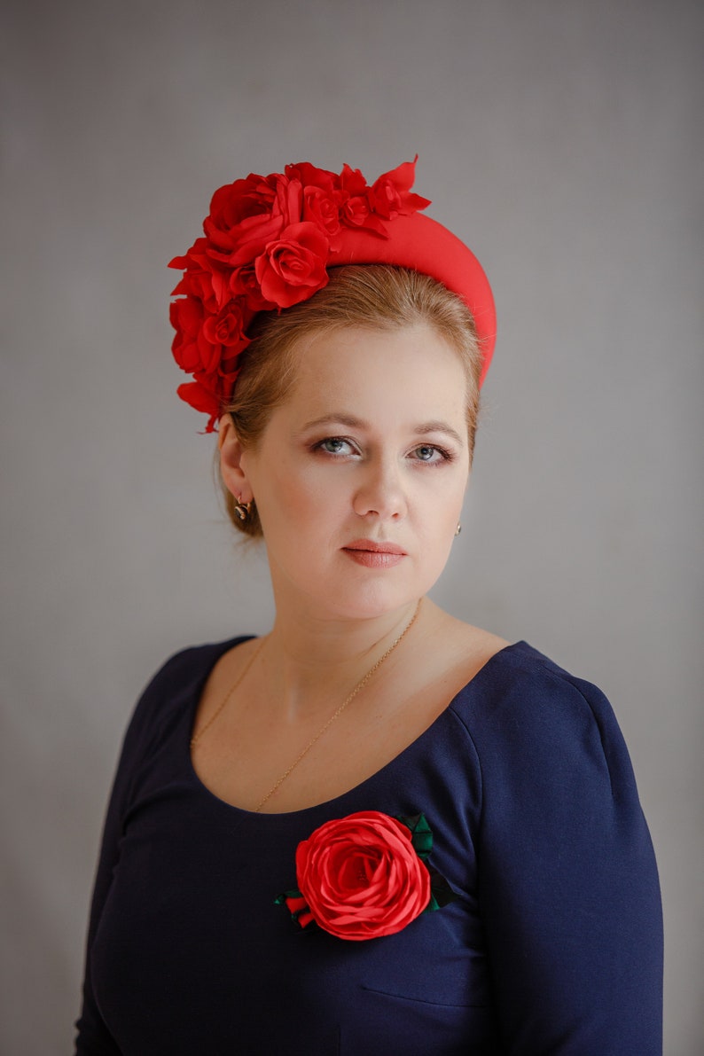 Rose crown is a fabulous floral headpiece. Red fascinator headband inspired by Kate Middleton headband hat. Perfect as a alternative to a traditional Kentucky Derby hat. Flower head piece has a perfect design. Padded headband covered in fabric