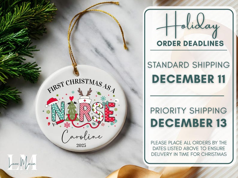 May include: A white ceramic Christmas ornament with a gold string. The ornament features the text "First Christmas as a Nurse" and the name "Caroline" with the year "2025". The word "NURSE" is decorated with festive holiday designs.
