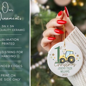 May include: A white ceramic Christmas ornament, 3 inches in diameter, featuring a yellow tractor illustration. The ornament has a gold string for hanging and includes the text "1st Christmas" and a name and year.
