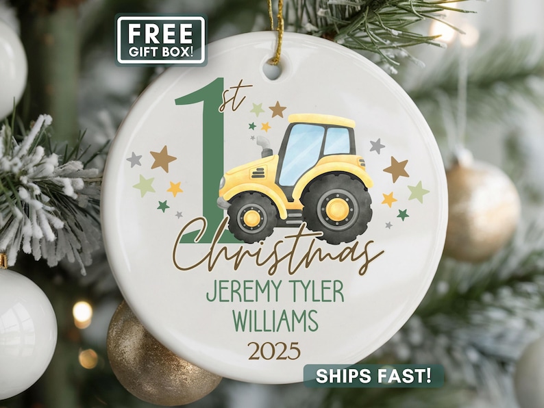 May include: A white ceramic Christmas ornament featuring a yellow tractor with black tires. The ornament includes the text "1st Christmas", personalized names, and the year 2025. Decorated with green and brown stars.