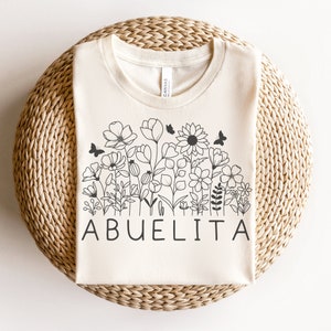 Mi Abuela Me Ama Baby Bodysuit | Spanish Grandma Loves Me Onesie