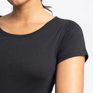May include: A black short-sleeved t-shirt with a round neckline.