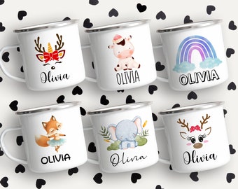 May include: Six white enamel mugs with different colorful illustrations and the name Olivia printed on each mug. The illustrations include a reindeer, a cow, a rainbow, a fox, an elephant, and a reindeer.