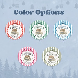May include: Five circular ornaments featuring vertical stripes in red, green, blue, pink, and olive. Each ornament displays a stack of books, a bow, and the text "Custome BOOK CLUB Emily 2026". The designs are numbered one through five for color selection.