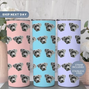 May include: Three stainless steel tumblers with dog face patterns in pink, blue, and lavender. Each tumbler has a matching lid and a clear straw. The tumblers are labeled "Straw Included" and "Stainless Steel". The text "Ship Next Day" is also visible.