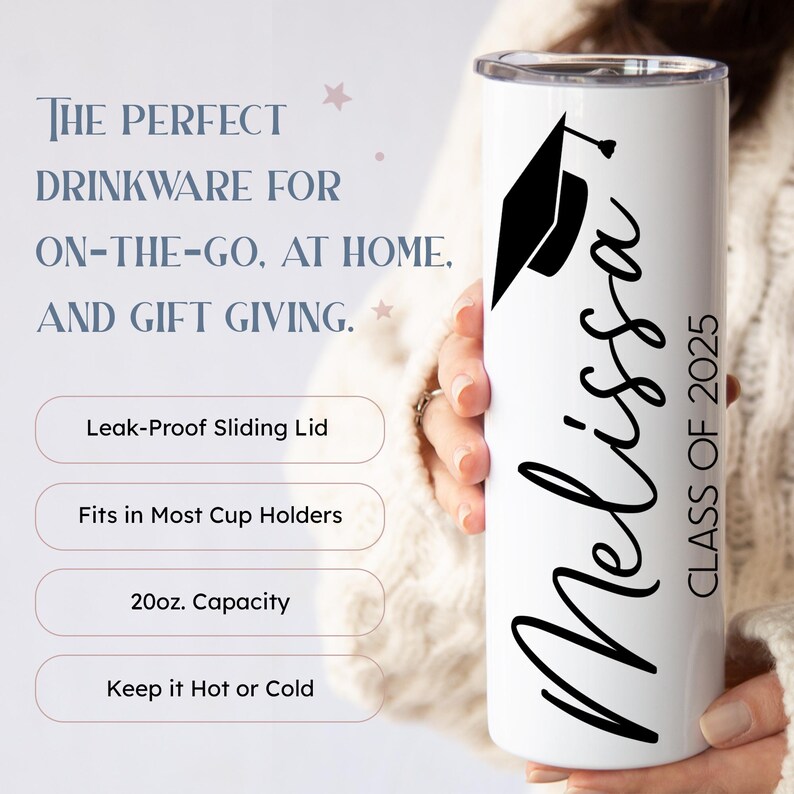 May include: White tumbler with a black graduation cap and the name "Melissa" and "Class of 2025" in black script. The tumbler has a leak-proof sliding lid, fits in most cup holders, and has a 20 ounce capacity.
