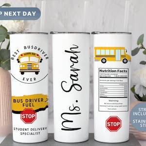 May include: A white stainless steel tumbler with a yellow school bus graphic and the text "Best Bus Driver Ever". The tumbler also has the text "Bus Driver Fuel" and a red stop sign. The tumbler is personalized with the name "Ms. Sarah".