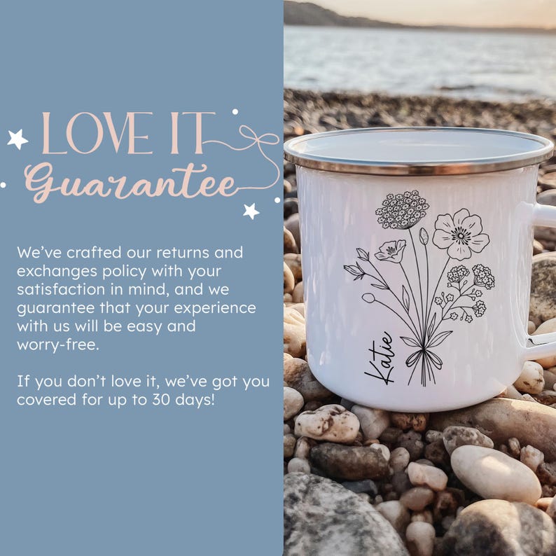 May include: White enamel mug with a black line drawing of a bouquet of flowers and the name "Katie" written below. The mug is sitting on a bed of small gray rocks.