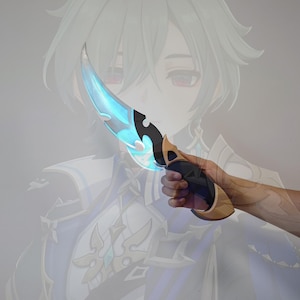 May include: A prop dagger featuring a curved, translucent blue blade that glows with internal light. The handle is black with gold-colored accents at the pommel and guard, designed with a sleek, ergonomic grip for a secure hold during display.
