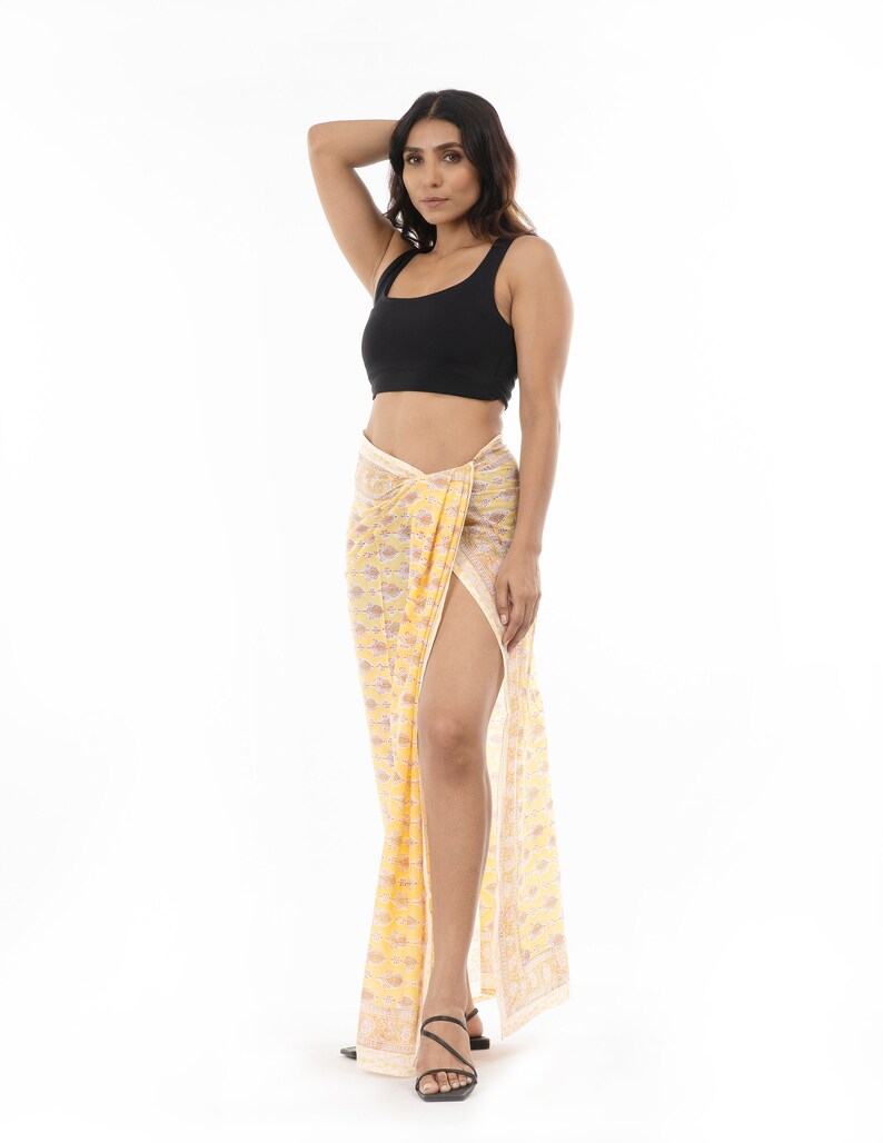Light yellow organic cotton sarong. Hand block printed using azo free pigments in a delicate yellow floral print. Light and soft organic cotton voile. Beach Dress. Summer dress. Scarf.