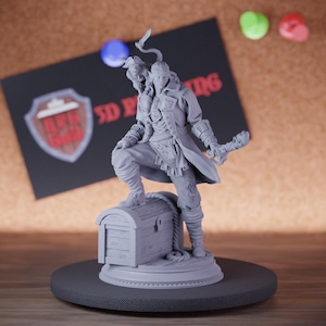 May include: A grey 3D-printed figurine of a pirate standing on a treasure chest. The pirate is wearing a long coat and holding a weapon. The figurine is on a round, dark grey base. A black card with the text "3D Printing" is in the background.
