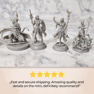 a group of miniature figurines sitting on top of a table