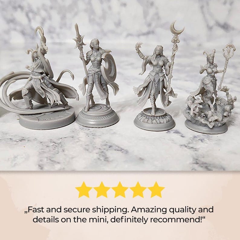 a group of miniature figurines sitting on top of a table