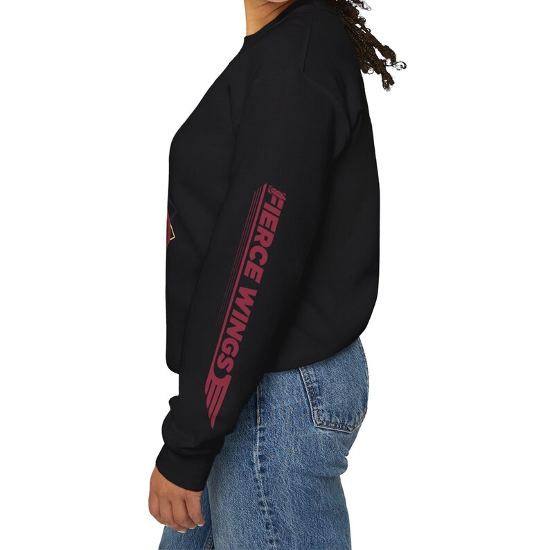May include: Black sweatshirt with long sleeves and a red graphic on the left sleeve that says "Fierce Wings" in a white outline.
