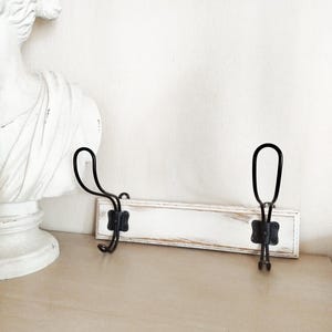 Antique French coat rack in shabby style, French and vintage patinated tea towel rack.