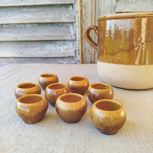 Poterie en terre cuite vernissée , escargot en relief