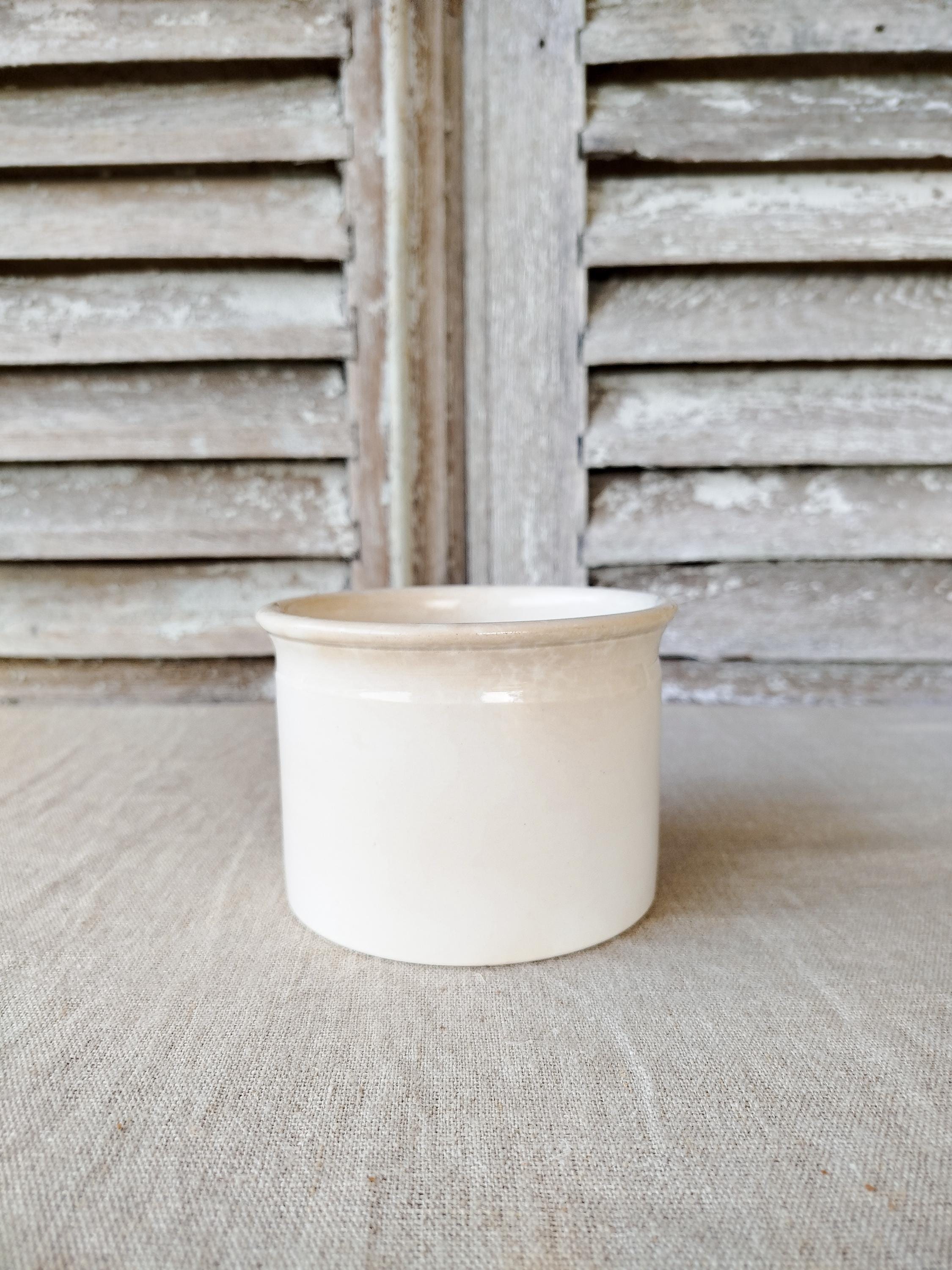 Antique Digoin and Sarreguemines pot, in patinated white earthenware.