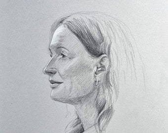 Attractive woman, profile portrait drawing, original hand drawn, pencil drawing, gray DIN A3 paper