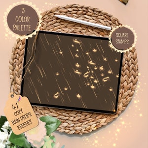 May include: A digital tablet displaying a digital illustration of 41 cozy rain drop brushes. The tablet is on a woven brown surface. The image also includes text that says "3 Color Palette" and "Square Stamps".