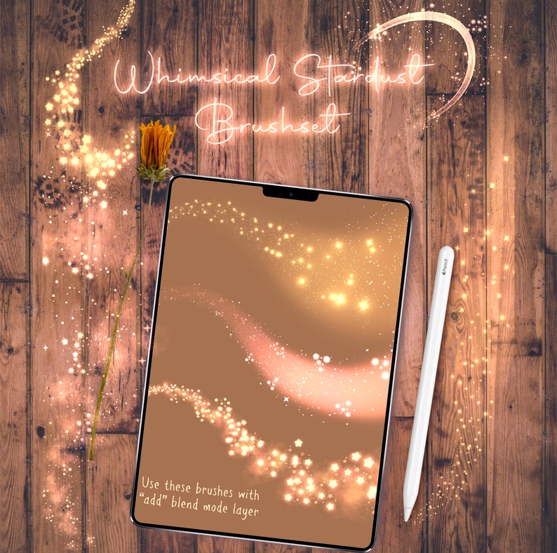 May include: A digital tablet displaying a preview of a set of whimsical stardust brushes. The brushes are shown on a brown background with a trail of sparkling stars. The text "Use these brushes with "add" blend mode layer" is displayed at the bottom of the screen.