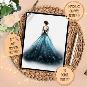 May include: A digital illustration of a woman wearing a sparkling blue gown. The illustration is on a tablet screen with a white background. The tablet is on a woven wicker surface. The text "87 COSY FASHION BRUSHSET" is on a brown tag. The text "MARKERS CANVAS INCLUDED" is on a white circle with a brown outline. The text "10 COLOR PALETTE" is on a white circle with a brown outline.