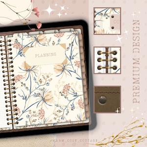 May include: A white planner with a floral design featuring blue and brown stems and pink and beige flowers. The planner has a gold spiral binding and a brown leather cover. The text "PLANNING" is printed on a beige label on the front cover.