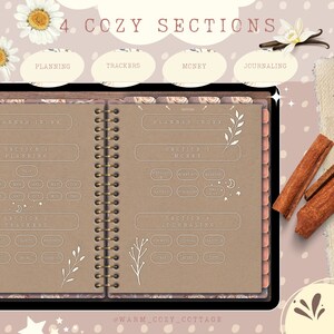 May include: A brown planner with a spiral binding. The planner is divided into four sections: Planning, Trackers, Money, and Journaling. Each section has a planner index and a list of topics. The planner has a rustic, cozy aesthetic.