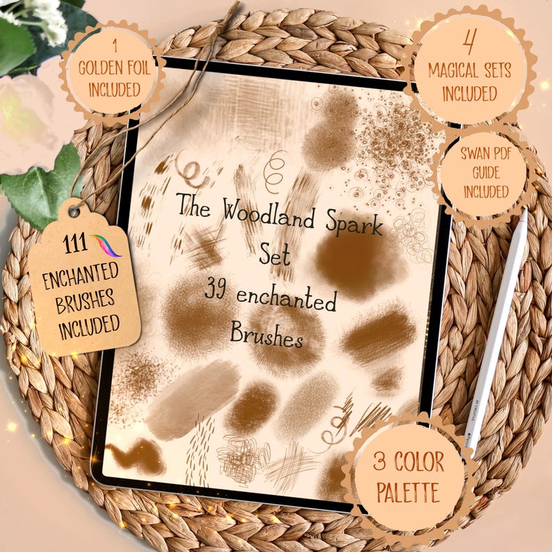 May include: A digital art set on a tablet, featuring the text "The Woodland Spark Set" with 39 enchanted brushes. Includes 111 enchanted brushes, 4 magical sets, a golden foil, a Swan PDF guide, and a 3-color palette. The tablet rests on a woven mat.