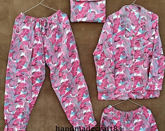 May include: A pink and white pajama set with a tropical leaf print. The set includes a long-sleeved shirt, pants, and shorts. The fabric is soft and comfortable.