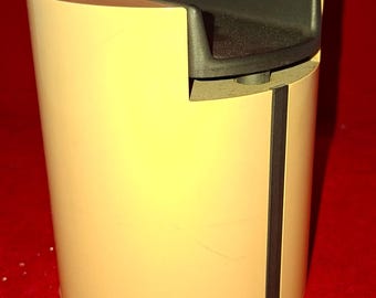 Soporte para teléfono de diseño vintage con caja de música, años setenta.