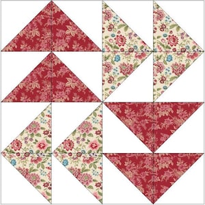 Puede incluir: Un patrón de bloque de edredón cuadrado compuesto por dieciséis triángulos más pequeños dispuestos en una cuadrícula. El diseño presenta secciones alternas de tela roja con estampado floral y tela color crema con un patrón floral multicolor.