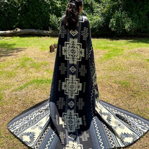 Alpaca Wool Blanket in color blue and white in King size with a geometric Navajo pattern, reversible