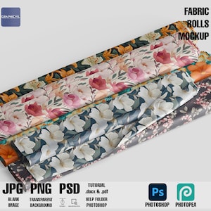 Peut inclure: Une maquette de rouleaux de tissu avec des motifs floraux. Les rouleaux sont empilés les uns sur les autres, le rouleau du dessus étant partiellement déroulé. Les motifs des tissus comprennent des fleurs blanches sur un fond bleu foncé, des fleurs roses sur un fond blanc, des fleurs jaunes sur un fond vert et des fleurs orange sur un fond noir. L'image comprend le texte "FABRIC ROLLS MOCKUP".