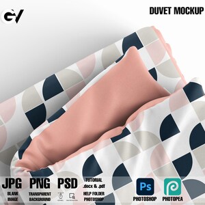 May include: A mockup of a duvet cover with a geometric pattern of pink, white and navy blue semi-circles. The duvet cover is folded and a matching pillow is placed on top. The text "DUVET MOCKUP" is at the top of the image.